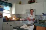 Jenny Carter in the kitchen of the beachhouse in Kitty Hawk, NC.