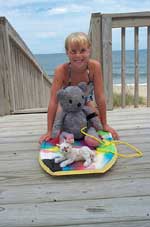 Sarah with "Bear", "Tracks", and boogie board.