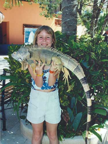 Sarah in Mexico with iguana.